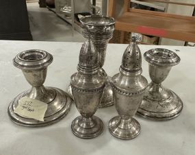 Three Weighted Sterling Candlesticks and Shakers