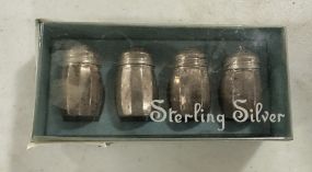 Four Sterling Silver Shakers