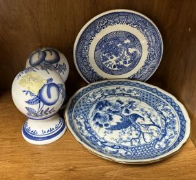 Blue and White Pottery Plates and Obelisk