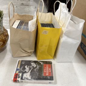 Collection of DVDS and VHS Tapes