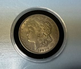 1921 Morgan Silver Dollar, plastic case, fine