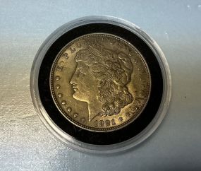 1921 Morgan Silver Dollar, plastic case, fine
