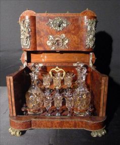 Burl walnut Tantalus set with bronze mounts