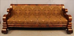 Large flame mahogany Empire sofa with scroll arms