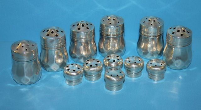 Six Sterling Shakers with lids and Six Sterling Lids