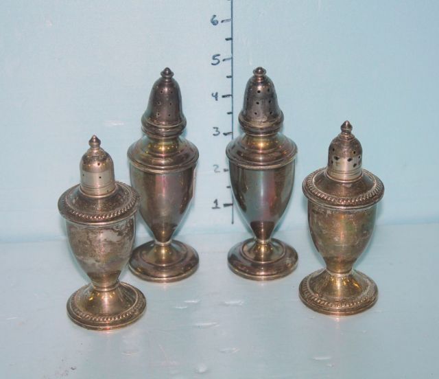 Two Sets of Sterling Salt and Peppers