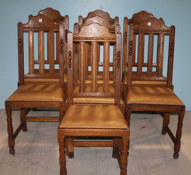 Seven Oak Chairs with Vinyl Seats
