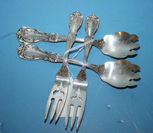 Two Sterling Reed and Barton "Burgundy" Ice Cream Forks and Two Sterling Reed and Barton Cocktail Forks in the "Burgundy" Pattern