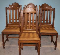 Seven Oak Chairs with Vinyl Seats