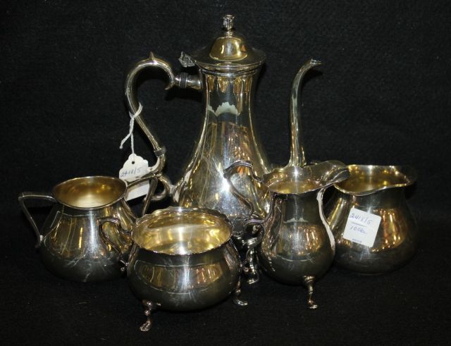 Rogers Silverplate Creamer and Sugar along with Three Piece International Silverplate Tea Set