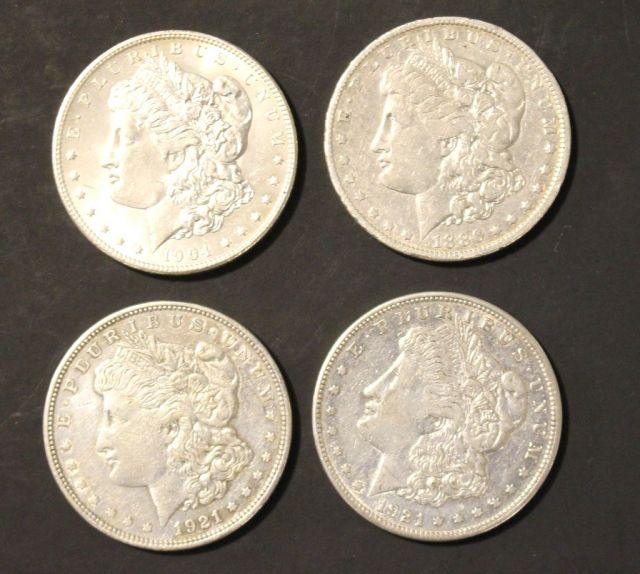 Four Morgan Silver Dollars