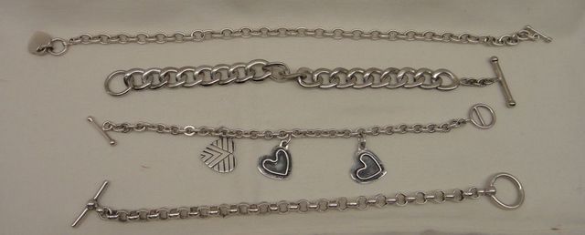 Four Sterling Lady's Charm and Link Bracelets