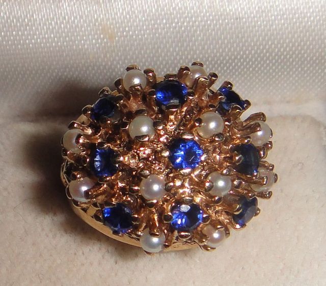One 10-14KT yellow gold lady's cast sapphire and pearl cluster ring