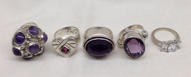 Five sterling Silver lady's amethyst rings