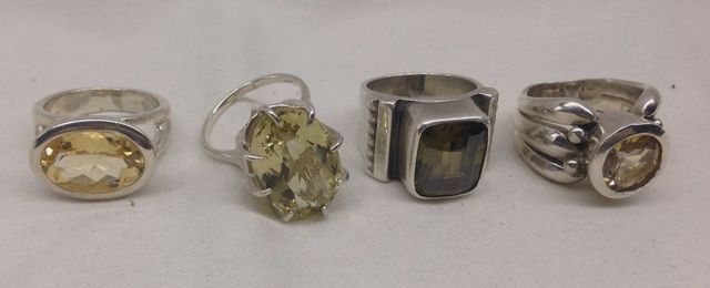 Four sterling Silver lady's citrine ring