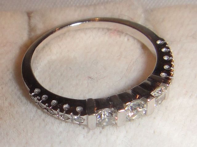 One Stamped 14KT White Gold Lady'sCast Diamond Band