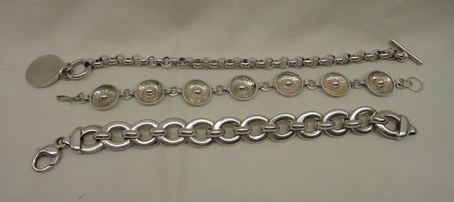 Three Sterling Lady's Charm and Link Bracelets