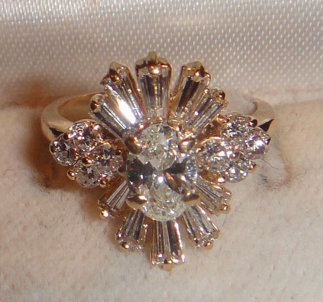 One 14KT Yellow Gold Lady's Cast Diamond Dinner Ring