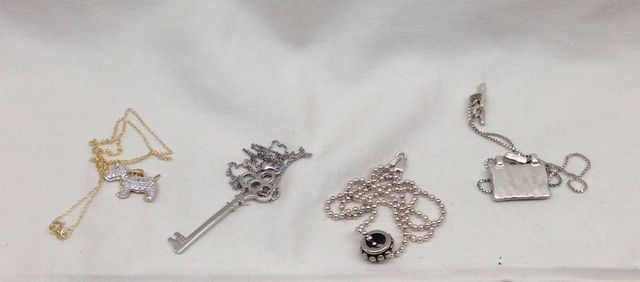 Four sterling Silver lady's assorted necklaces