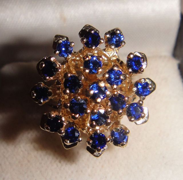 One stamped 14KT yellow gold lady's cast sapphire cluster ring