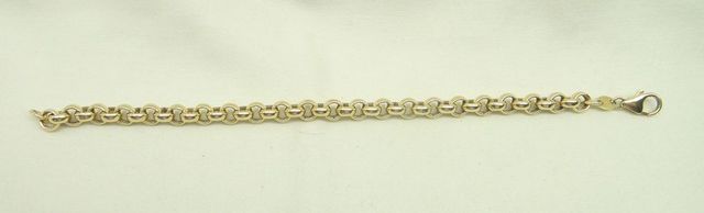 One stamped 14KT yellow gold lady's 7" long, 6.3mm wide rolo bracelet