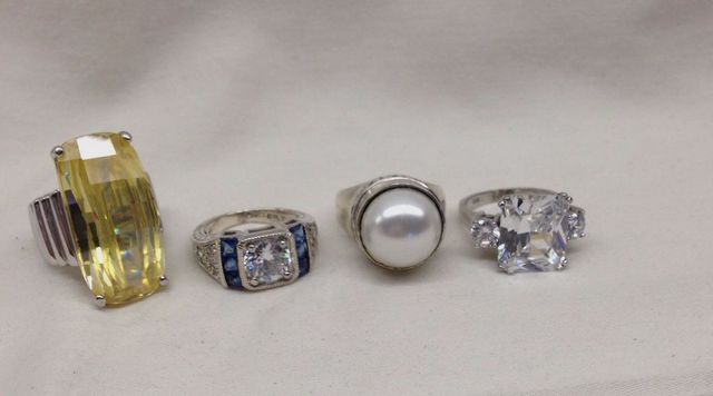 Four Stamped Sterling Silver Lady's Simulated Gemstone Rings
