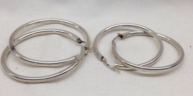 Two Pair Sterling Silver Lady Hoop Earrings