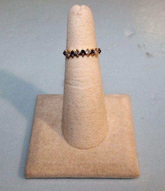 One stamped 14KT yellow gold lady's cast sapphire and diamond band