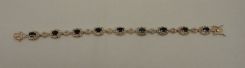 One sterling silver, diamond, and sapphire, lady's bracelet