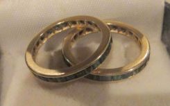 Two 10-14KT yellow gold lady's cast emerald simulant bands with a azured shanks with a bright polish finish. Total Weight of Bands 2.30 dwt.