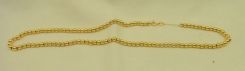 One Stamped 14KT Yellow Gold Lady's Beaded Necklace with a Bright Polish Finish