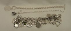 Three Sterling Lady's Charm and Link Bracelets; 3.69 ozt