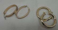 Two sets of stamped 10-14KT yellow gold lady's hoop earrings. Total Weight of Earrings 3.00 dwt